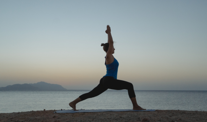 warrior one pose, mental health benefits of yoga